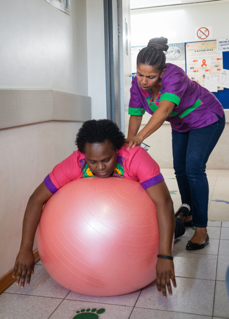 Demonstration of use of birthing ball during labour